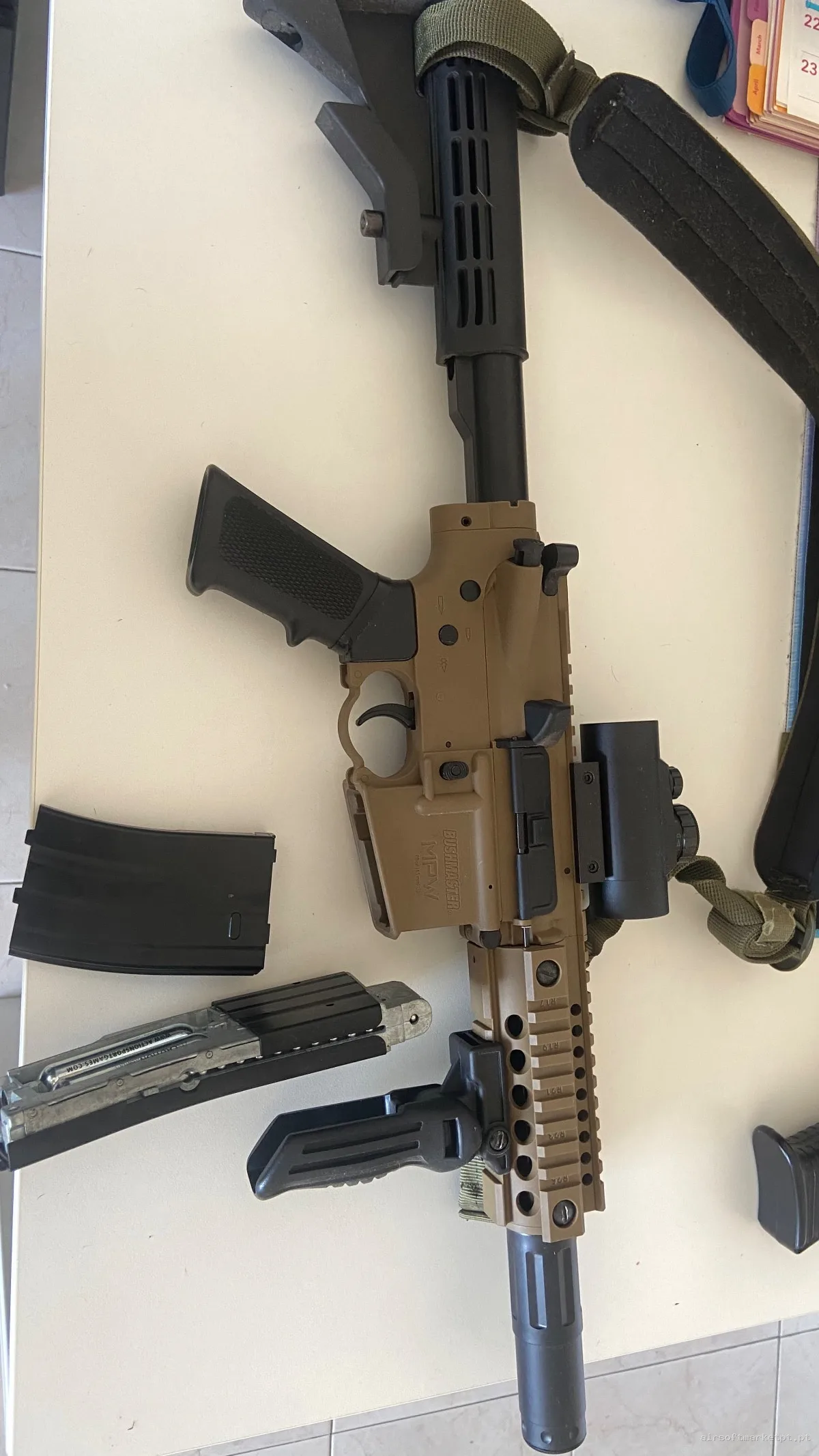 Crosman Bushmaster 4,5mm MPW FULLAUTO — Rifles de Assalto (AR/M4/AK) — Airsoft Market PT